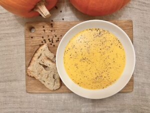 Served pumpkin soup.