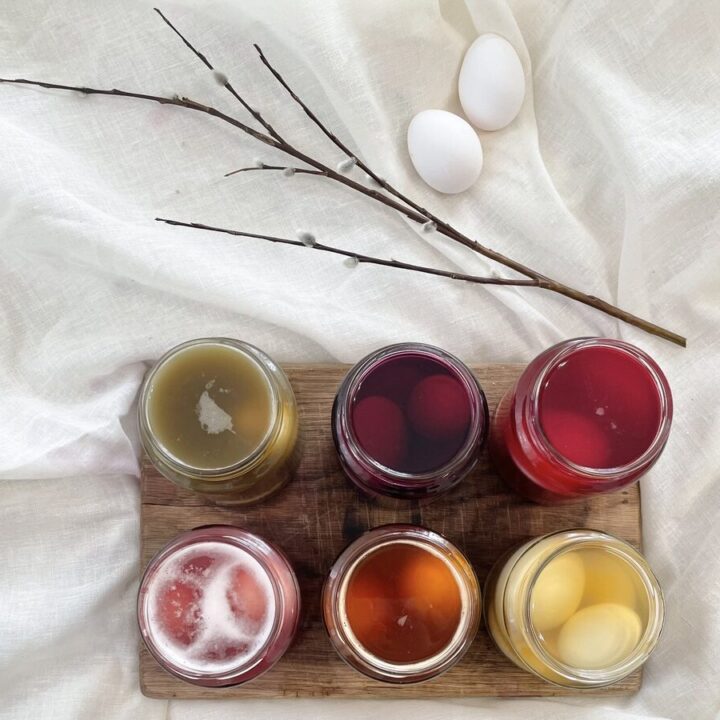 Easter eggs in different colours of water.