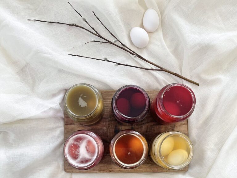 Easter eggs in different colours of water.