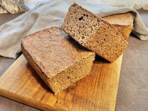 Rye bread on cutting board.