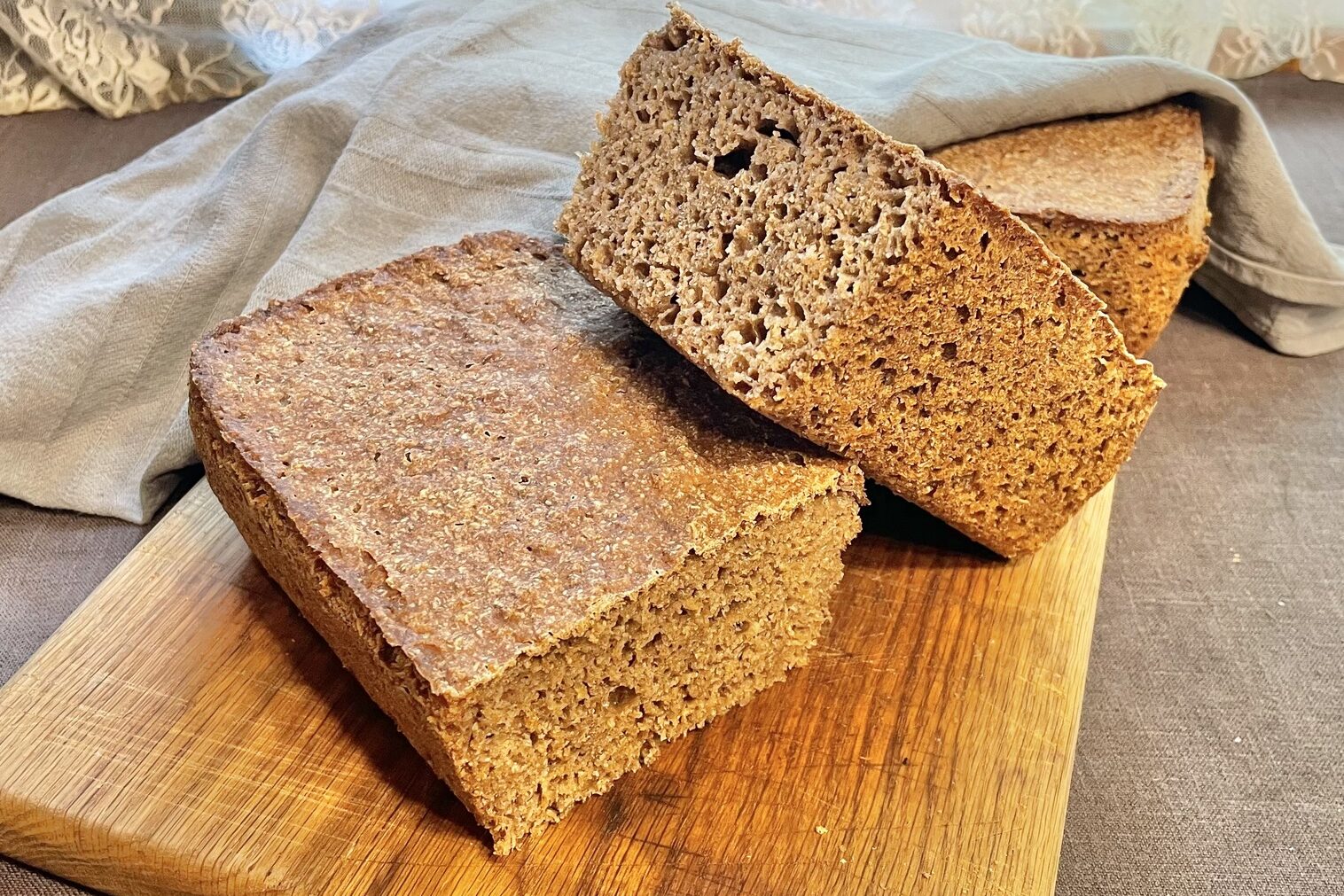 Rye bread on cutting board.