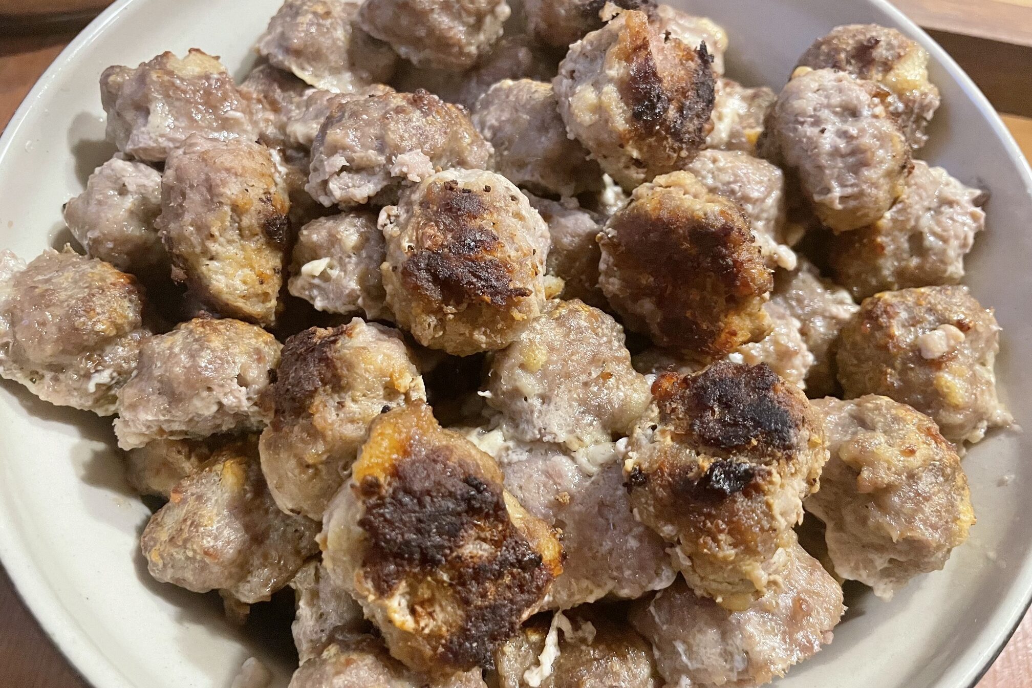 Cooked meatballs on a plate.