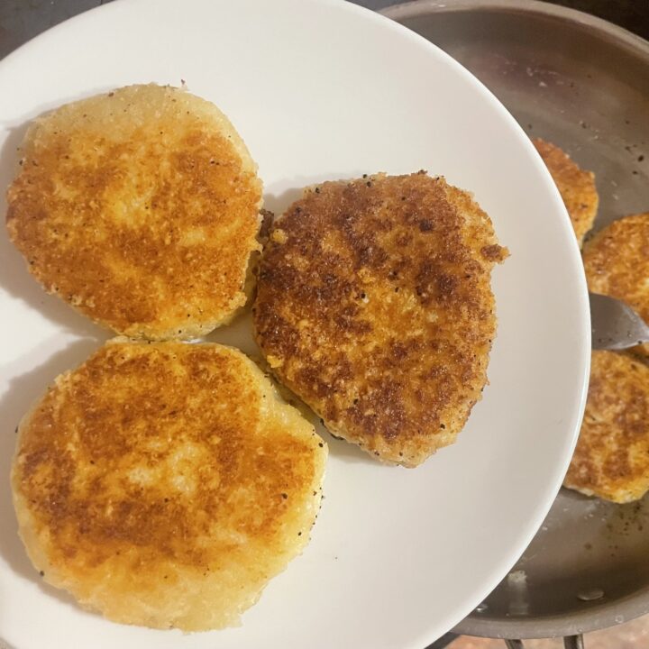 Cheese schnitzels on a plate.