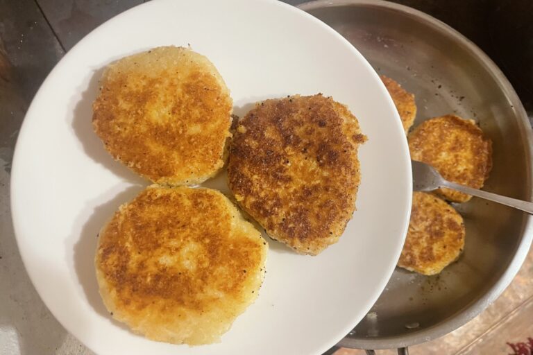 Cheese schnitzels on a plate.