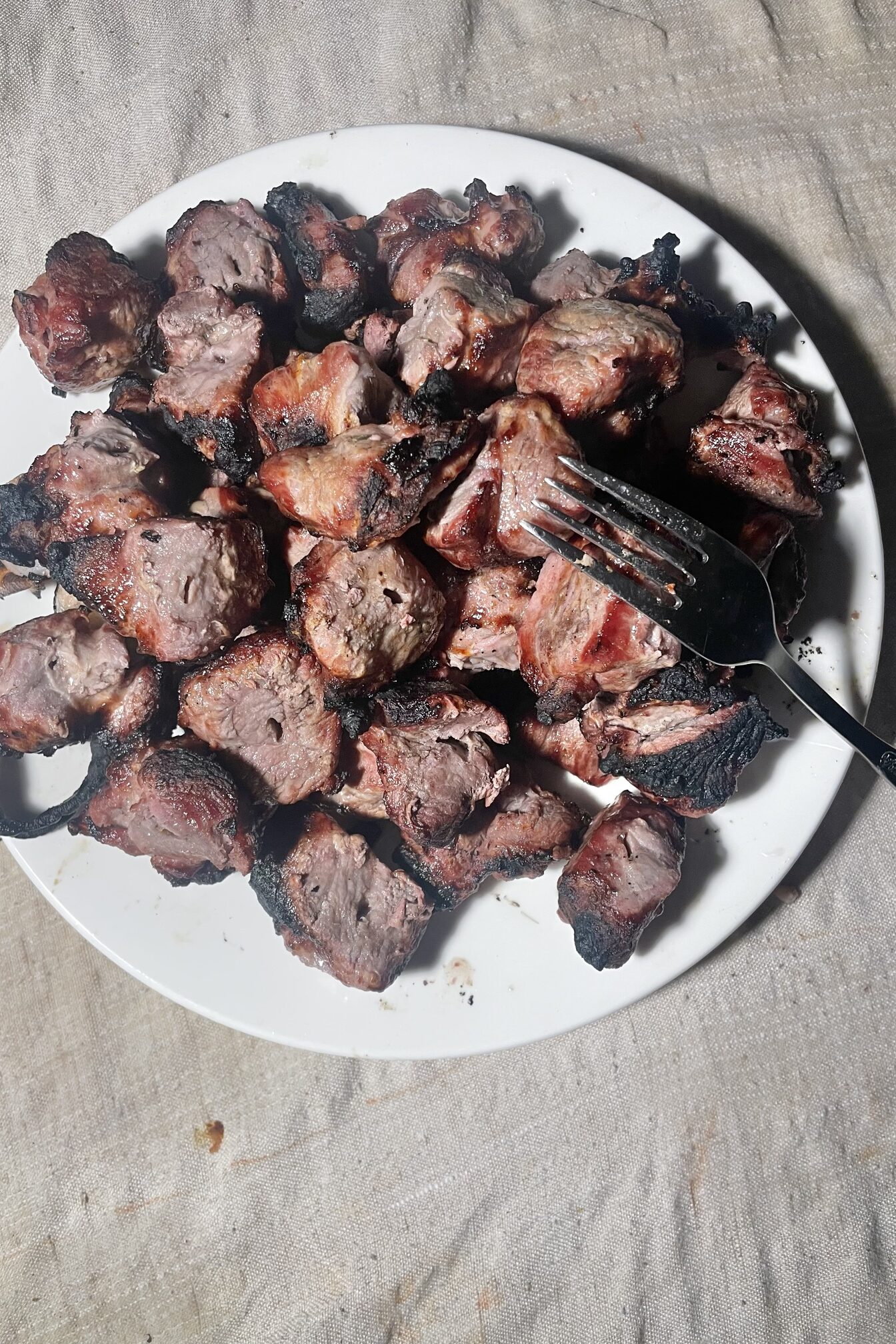 Pork shashlik on a plate.